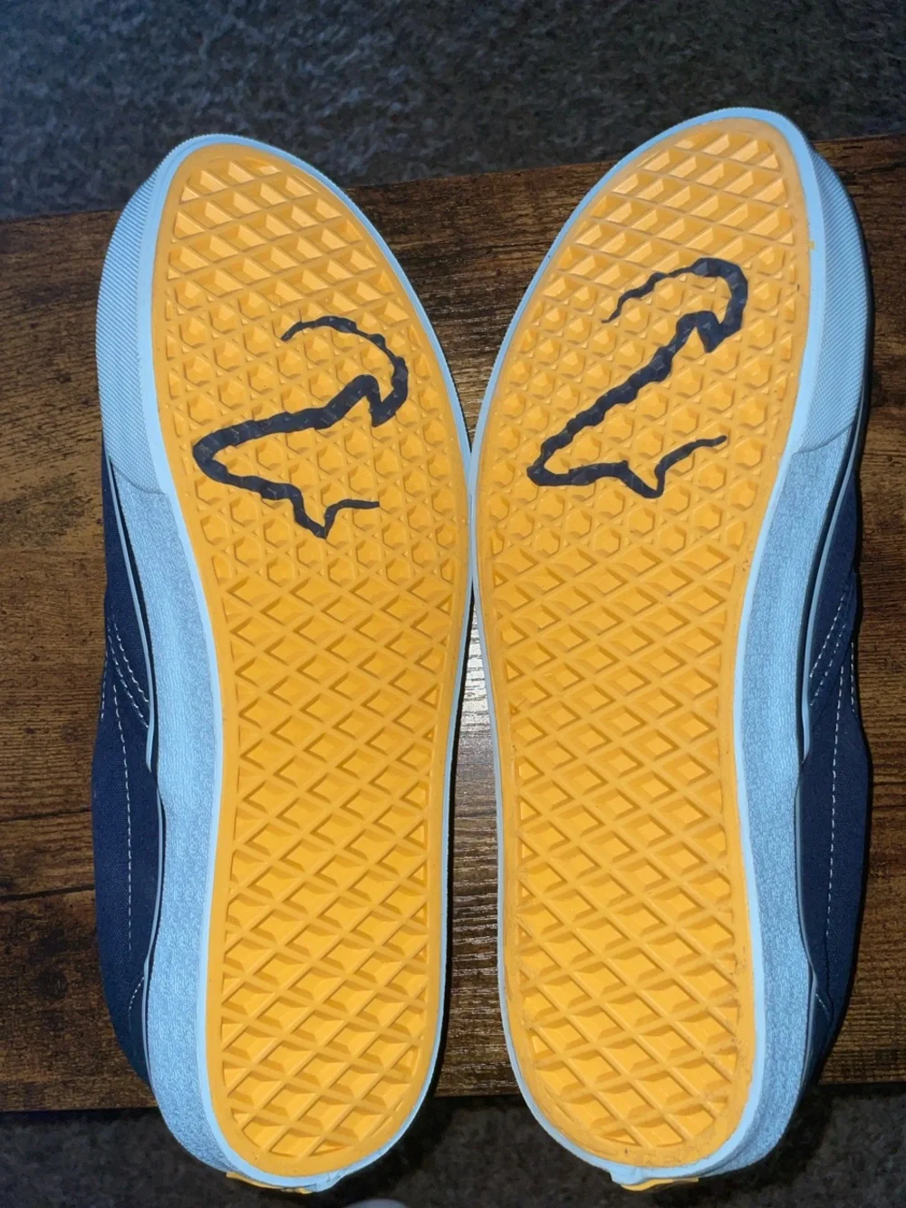 Vans Men’s Navy Canvas Slip-On with Yellow Details